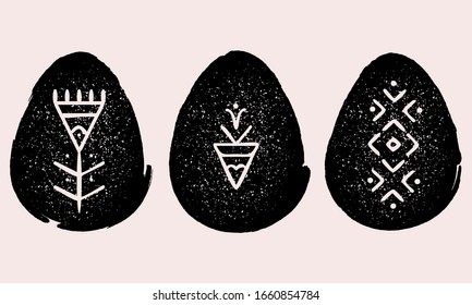 Set of grunge Easter eggs with ethnic, tribal, hand drawn elements. Vector illustration isolated on pink background. Best for greeting card design. 