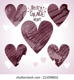 set of grunge hearts. hand-drawn bordo design elements