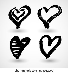 Set of grunge hearts. Vector heart shapes.