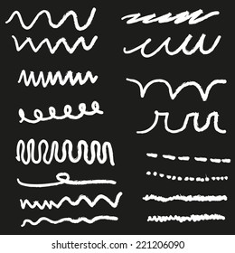 Set of grunge modern doodle handdrawn elements on chalkboard