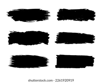 Ensemble de formes grunge en noir isolé sur fond blanc. Peinture noire, coups de pinceau à l'encre, grunge. Illustration vectorielle dessinée à la main