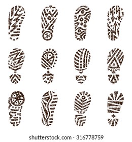 Set of grunge shoe tracks. Hand drawn doodles Vector illustration. 
