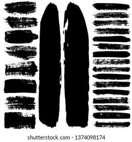 Set of grunge spots, strokes. Dry brush strokes vector