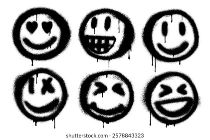 Set of grunge spray painted graffiti smiling face emoticon isolated on white background. Graffiti Smile in love emoticon icon with over spray in black over white. Vector graffiti with paint drips.