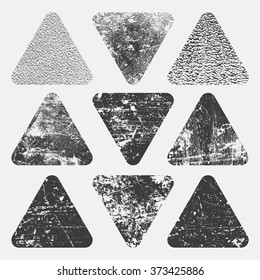 Set of grunge triangles. Damage triangle grunge shape silhouette. Distressed grunge texture. Vector illustration