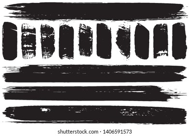 A set of grunge vector brushes. Strokes of black paint on white paper