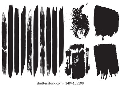 A set of grunge vector brushes. Strokes of black paint on white paper