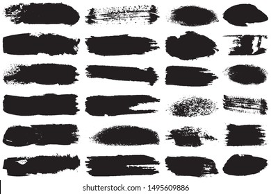 A set of grunge vector brushes. Strokes of black paint on white paper