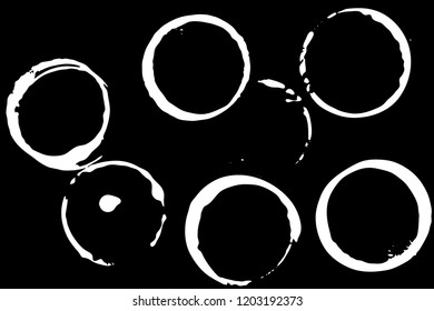 Set of grunge vector coffee cup stains or vine glass marks isolated on black. Ink, wine, water, paint or other liquid cup stains. Spray splashes collection