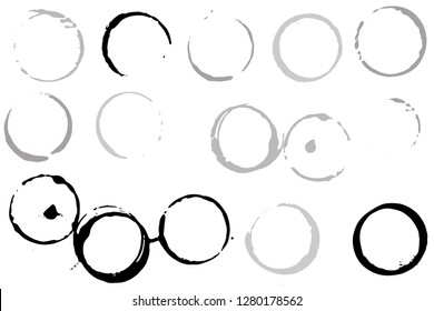Set of grunge vector coffee cup stains or vine glass marks isolated on white. Ink, wine, water, paint or other liquid cup stains. Spray splashes collection