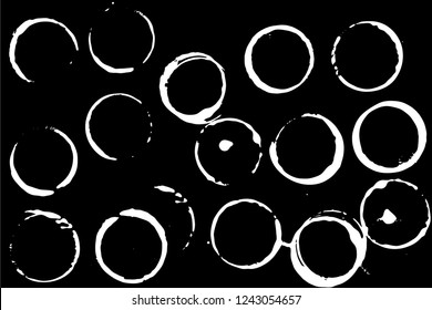 Set of grunge vector cup stains or glass marks isolated on black. Ink, wine, water, paint or other liquid cup stains. Spray splashes collection