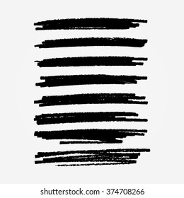 A set of grunge vector ink brush strokes in black as individual objects. Ready to use design elements for your projects.