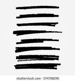 A set of grunge vector ink brush strokes in black as individual objects. Ready to use design elements for your projects.