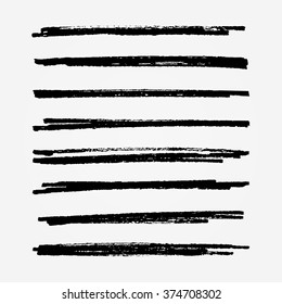 A set of grunge vector ink brush strokes in black as individual objects. Ready to use design elements for your projects.