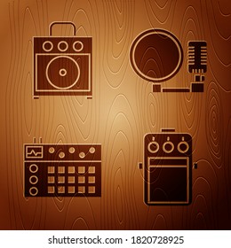 Set Guitar pedal, Guitar amplifier, Drum machine and Microphone on wooden background. Vector