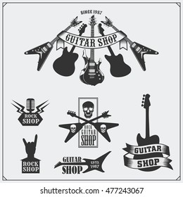 Set of guitar shop labels, emblems, badges and music icons.