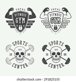 Set of gym logos, labels and badges in vintage style