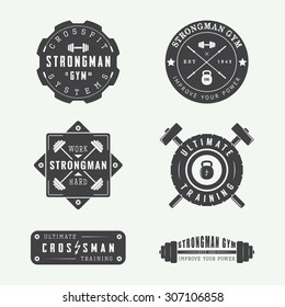 Set of gym logos, labels and slogans in vintage style