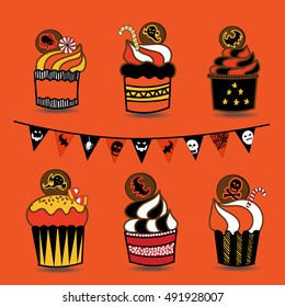 A set of Halloween cupcakes with candy, bat, ghost, skeleton, skull, and cat, items in orange, yellow, black and white colors.