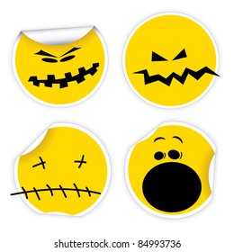 Set of Halloween yellow labels with various smiles