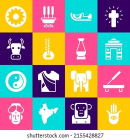 Set Hamsa hand, Scented spa stick, India Gate in Delhi, Indian shoes, Sitar, Cow, Chakra and vase icon. Vector