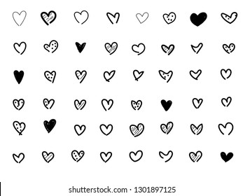 Set of hand doodle black hearts