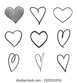 Set of hand drawn abstract hearts on isolated white background. Black and white illustration. Sketchy elements for design