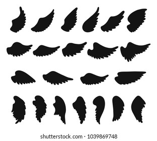 Set of hand drawn angel or bird wings silhouettes. Monochrome drawing elements. Vector illustration EPS 10 isolated on white background.
