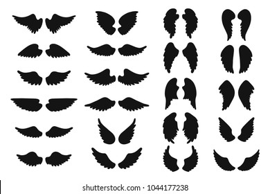Set of hand drawn angel or bird wings silhouettes. Monochrome drawing elements. Vector illustration EPS 10 isolated on white background.