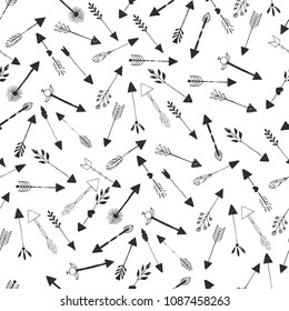 Set of hand drawn arrows. Black and white seamless pattern.