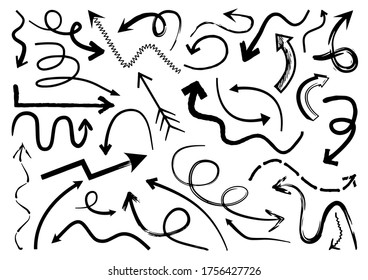 Set of hand drawn arrows doodle design elements Premium Vector