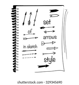 set of hand drawn arrows in hipster style on notebook background - vector illustration
