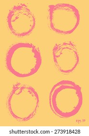 Set of hand drawn artistic dirty pink brush messy muddy grungy circles on yellow background. Vector esign elements collection