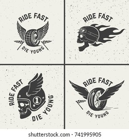 Set of hand drawn biker emblems. Skull with fire, winged wheel. Design elements for poster, emblem, sign, t shirt. Vector illustration