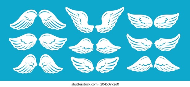 Set of hand drawn bird or angel wings of different shape. Vector illustration