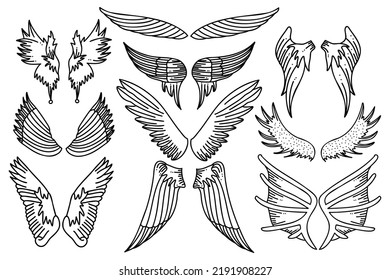 Juego de alas de pájaro dibujadas a mano o ángel con diferentes garabatos de forma