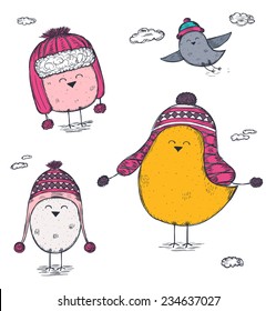 set of hand drawn birds wearing a winter hats