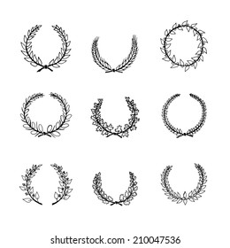 Set of hand drawn black and white silhouette circular laurel foliate and wheat wreaths depicting an award achievement heraldry nobility