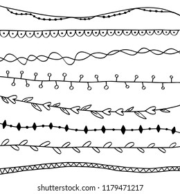 Set of hand drawn Borders and Dividers. Vector Illustration.