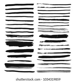 Set of hand drawn brush lines. Ink stroke and text dividers.