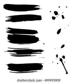 Set of hand drawn brushes and design elements. black paint, ink artistic creative shapes. Vector illustration.