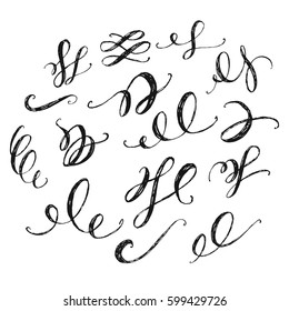 Set of hand drawn calligraphic swirls. Rough inky texture.