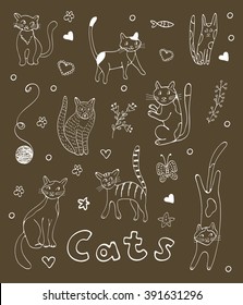 Set of hand drawn cats. White silhouettes on black