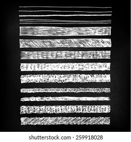 A set of hand drawn chalkboard style patterns in white on blackboard. Brush stroke pattern card templates.