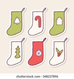 Set of hand drawn christmas sock stickers with different sewn decorations for your design. Doodle holiday clip art. Vector illustration