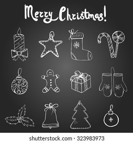 Set of hand drawn Christmas symbols and elements on the blackboard