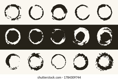 Set of hand drawn circles on a black and white background. Templates for design. Rounded shapes with spots in grunge style. Ink splatter.