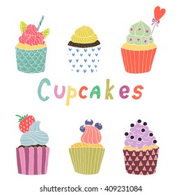 Set of hand drawn colored cupcakes. Vector illustration 