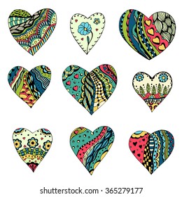 Set Hand drawn colored hearts in zentangle style. Pattern for coloring book. Coloring page for adult anti stress. Made by trace from sketch. Valentine's day background.