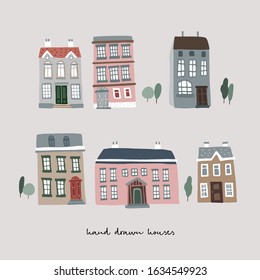 Set of hand drawn colorful old houses. Real estate icons isolated on white background. Town, village concept, urban landscape. Collection of vector cartoon illustrations.